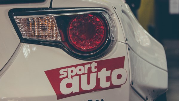 Sports Car Lights Sticker Inscription wallpaper