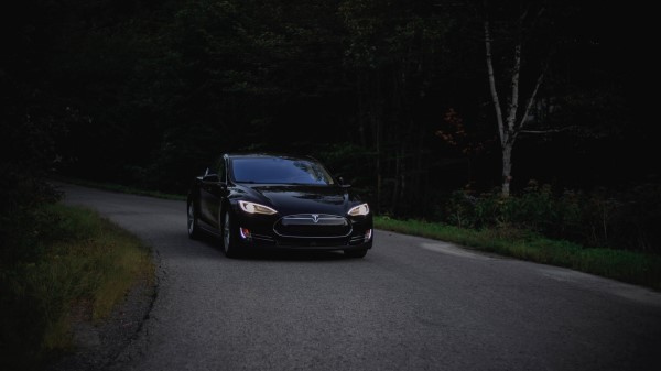 Tesla Car Asphalt Wallpaper