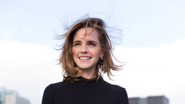 Emma Watson Cute Smiling Hairs In Air Ps Wallpaper