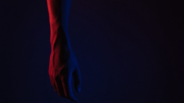 Hand Lighting Dark Wallpaper