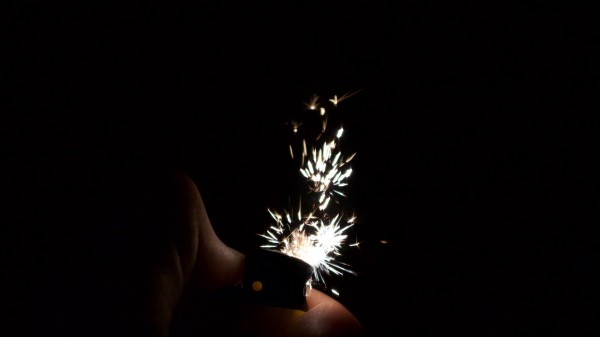 Lighter Sparks Dark Wallpaper