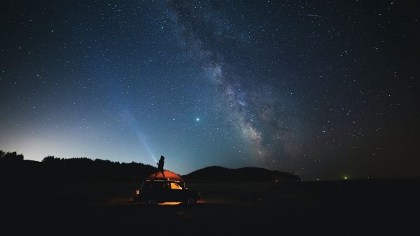 Man Flashlight Car Wallpaper