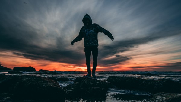 Man Sea Sunset Wallpaper