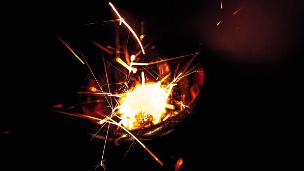 Sparks Fire Glow Wallpaper