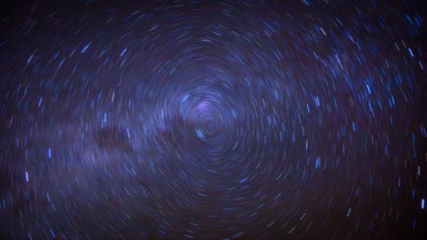 Twisting Stars Space Wallpaper