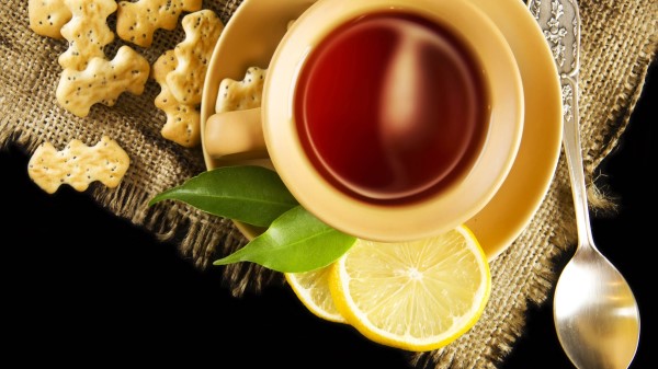 Tea Lemon Pastry Poppy Cup Saucer Leaves Spoon Black Background Wallpaper