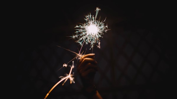 Bengali Fire Sparks Holiday Hand Wallpaper