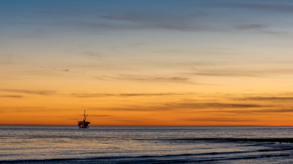 Construction Sea Sunset Wallpaper