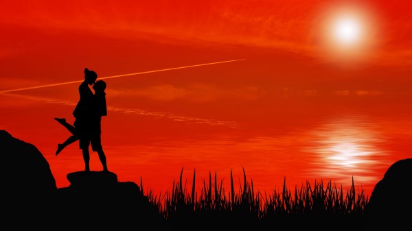 Silhouettes Couple Kiss wallpaper