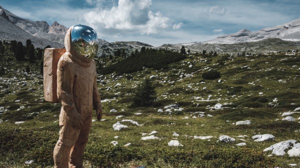 Cosmonaut Spacesuit Sculpture Wooden Wallpaper