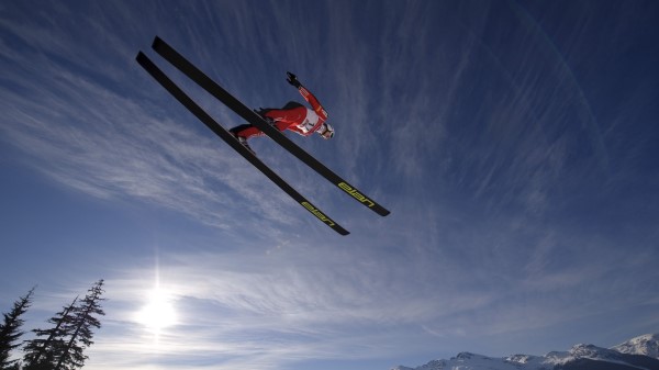 Skier Ski Jump Fly Sky Sun Mountain wallpaper