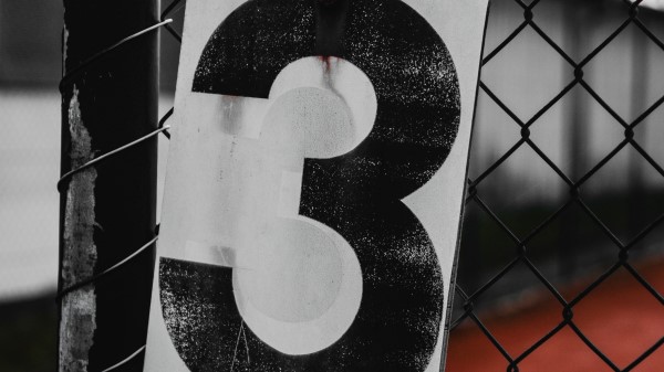 Figure Three Inscription wallpaper